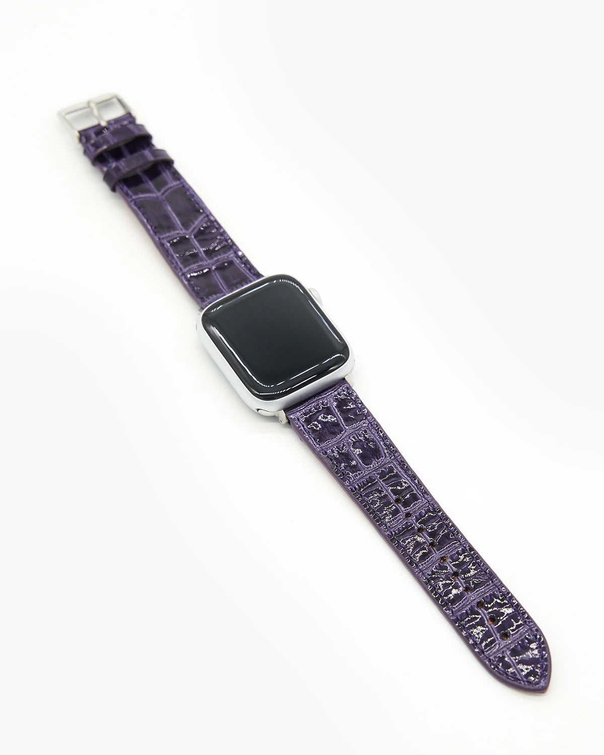 Mor parlak Croco desenli deri kordonun Apple Watch üzerinde görünümü; saat dahil değildir